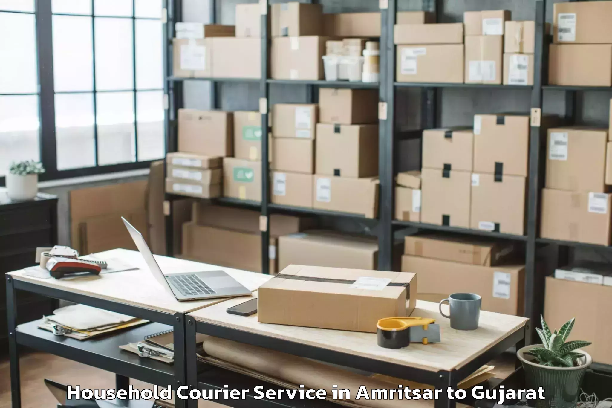 Top Amritsar to Modasa Household Courier Available